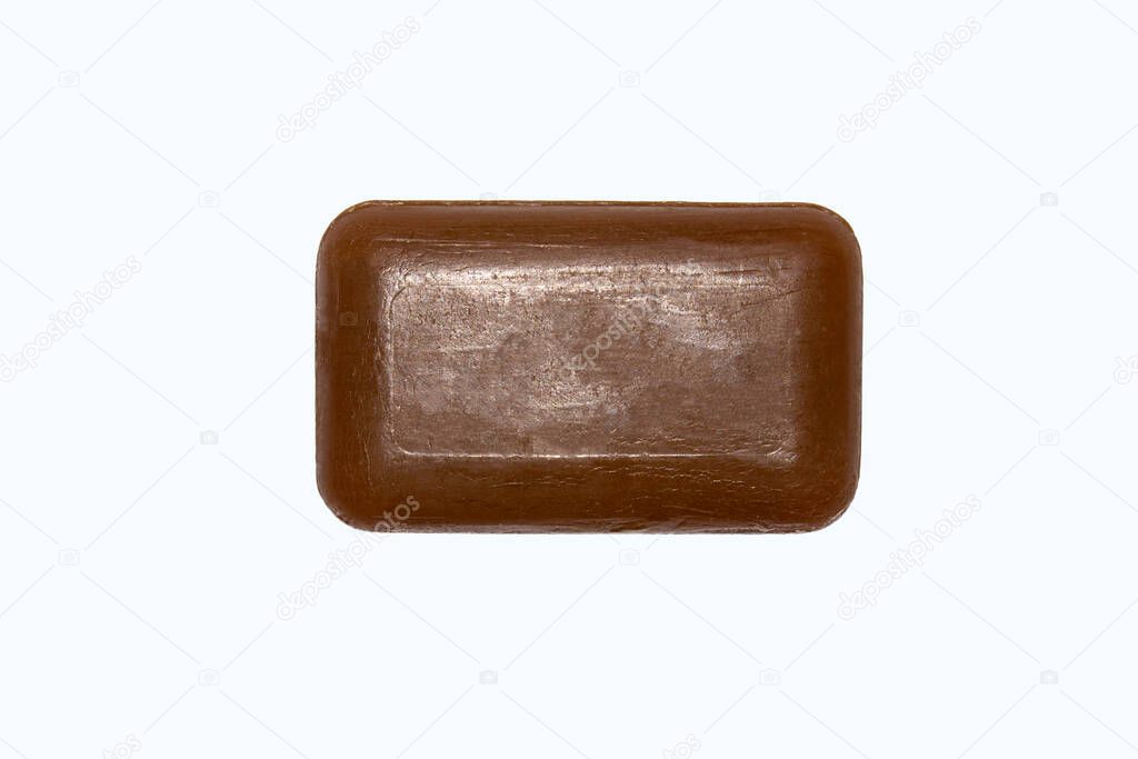 Tar soap isolated on white background.A piece of medical tar soap.