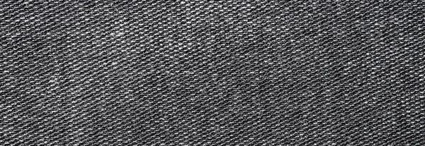 뜨개질은 촘촘하며 카펫의 어두운 배경은 — 스톡 사진