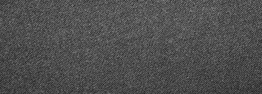 Koyu gri arka plan. Siyah flütlü denmin dokusu. Siyah kotun arka planı..