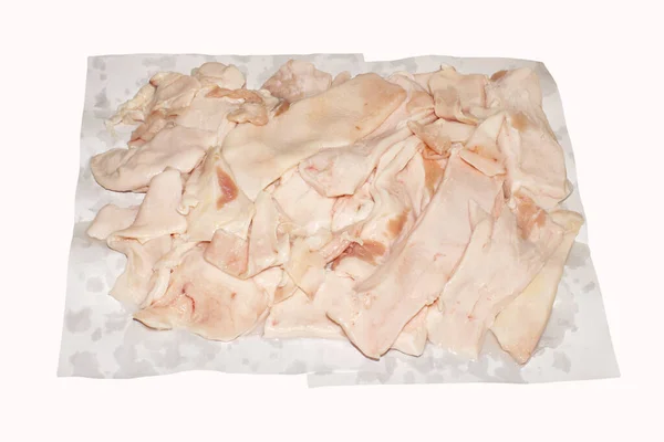 Chunks of raw lard.Pork fat background top view.Pieces of pork skin and fat.
