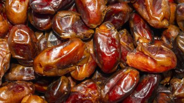 Kurumuş tarihler arkaplan üstü görünümü. Olgun kurumuş tarihlerin arkaplanı.