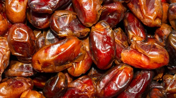 Kurumuş tarihler arkaplan üstü görünümü. Olgun kurumuş tarihlerin arkaplanı.