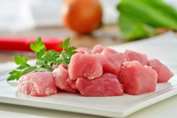 Meat cubes, raw red meat Stock Image
