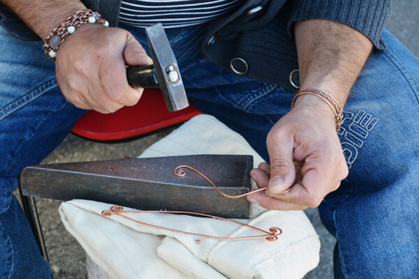 Jeweler creates copper wire jewelry