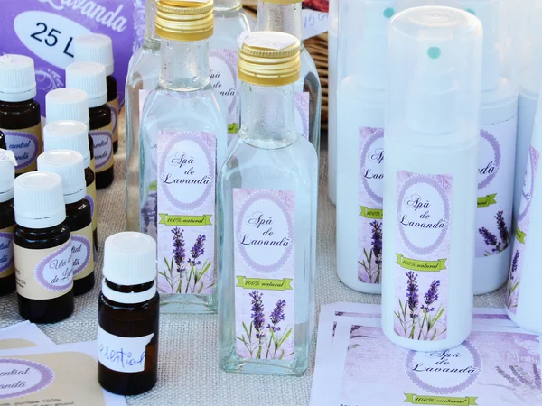 Lavender essential oil, lavender flower water — Stock Photo, Image