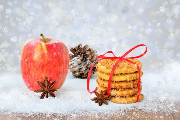 Vánoční pozadí s světla ovoce a soubory cookie — Stock fotografie