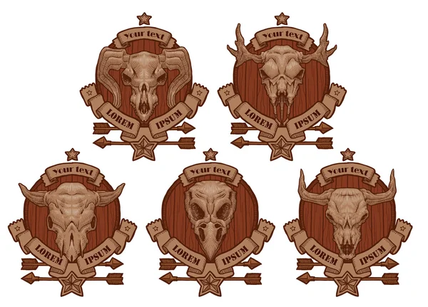 Zeichnung von Emblemen mit Tierschädeln. — Stockvektor