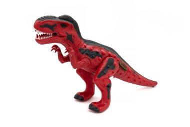 Beyaz arka planda izole edilmiş plastik dinozor oyuncağı