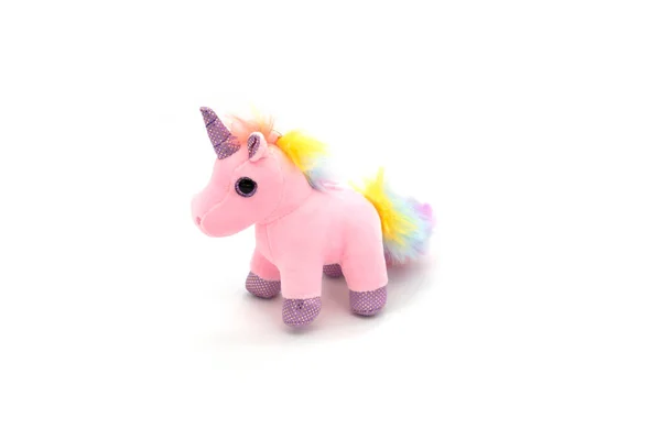 Giocattolo di peluche unicorno rosa. Isolato su sfondo bianco — Foto Stock