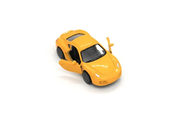 Pequeno modelo de carro isolado no fundo branco — Fotografia de Stock
