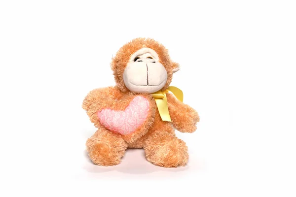 Плюшева іграшкова мавпа ізольована на білому . — стокове фото