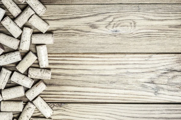 Close-up of wine corks in horizontal format on a wooden background