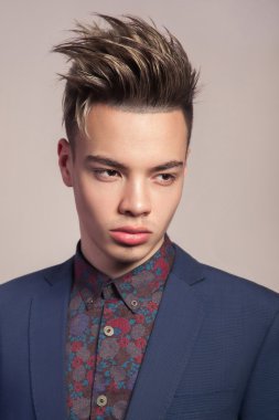 Sexy young fashion model with highlighted haircut