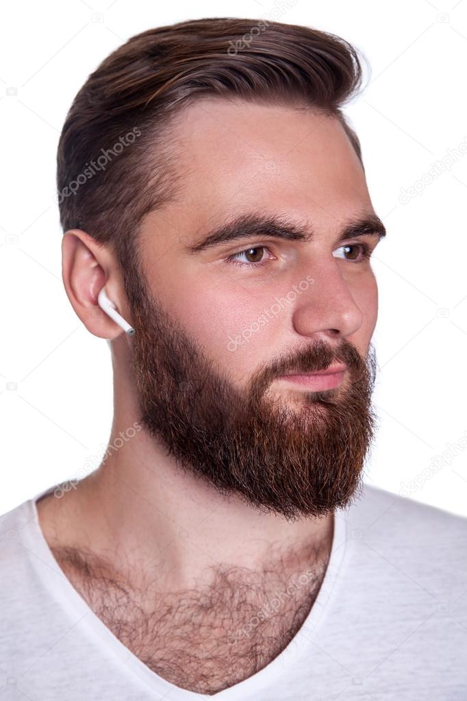 Young man with wireless earphones