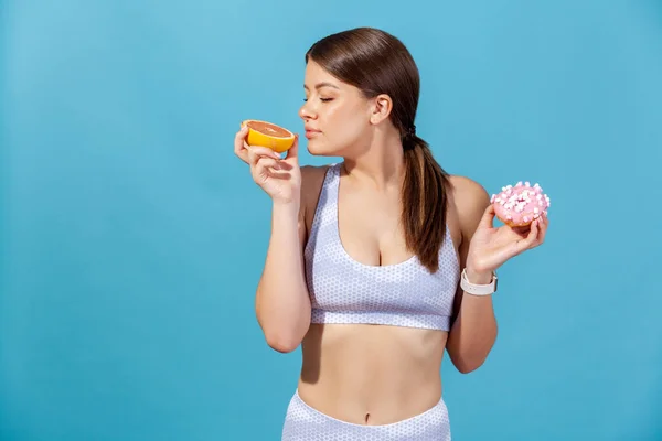 Sportive Woman White Top Holding Hands Half Juicy Grapefruit Donut — Stock Photo, Image