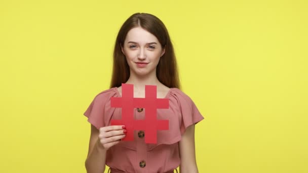 Smiling Girl Blogger Friendly Kind Face Expression Holding Red Hash — Stock Video