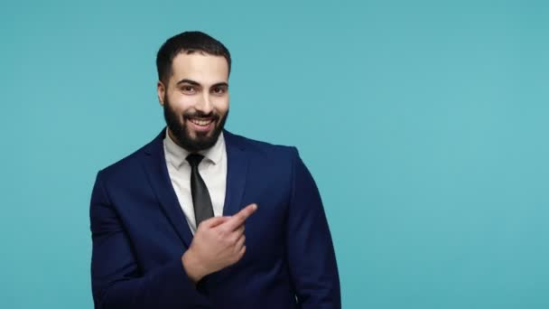 Look Here Joyful Brunette Bearded Businessman Suit Pointing Copy Space — Stock Video