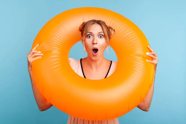 Shocked Female Blonde Hair Two Hair Buns Holding Rubber Ring — Stock Photo, Image