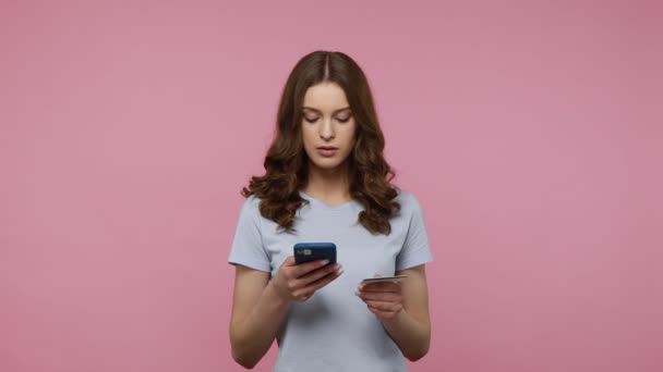 Concentrated Woman Young Age Blue Shirt Typing Smartphone Thoughtful Expression — 图库视频影像