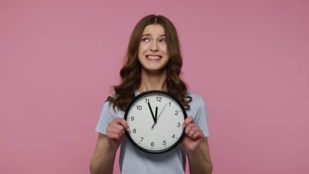 Happy Glad Teenager Girl Holding Big Wall Clock Looking Camera — Stock Video