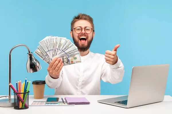 Happy Excited Bearded Man Showing Thumbs Gesture Holding Fan Dollar — 스톡 사진