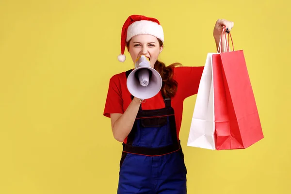 Female Courier Screams Megaphone Showing Shopping Bags Announcing Discounts Delivery — Stock Photo, Image