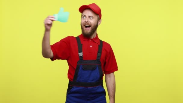 Happy Worker Male Showing Paper Thumb Winking Camera Expressing Positive — Stock Video