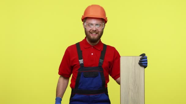 Excited Builder Carpenter Holds Wood Plank Fretsaw Being Ready Work — Stock Video