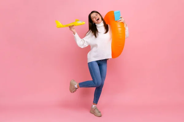 Full Length Portrait Happy Woman Holding Orange Rubber Ring Plane — Stock Photo, Image