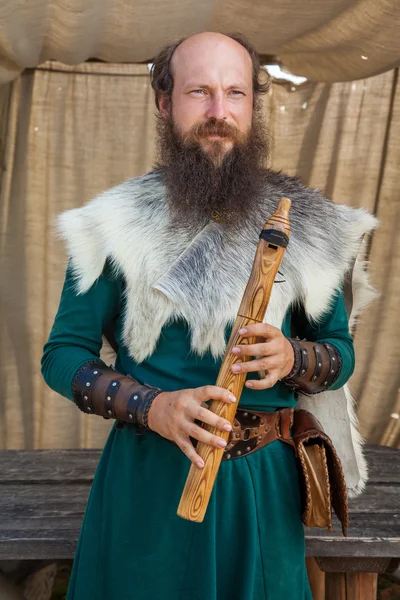Viking flute player — Stock Photo, Image