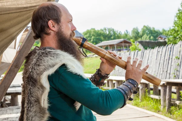 Viking flute player — ストック写真