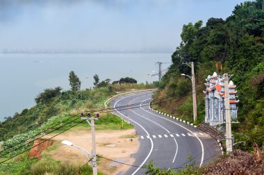 View on road from Son Tra in cloudy day Danang city clipart