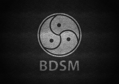 Bdsm işareti beyaz siyah deri dokusu üzerinde kabartmalı