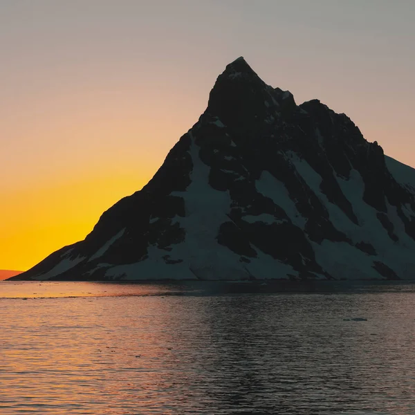 Lemaire strait coastal landscape, mountains and icebergs, Antarc