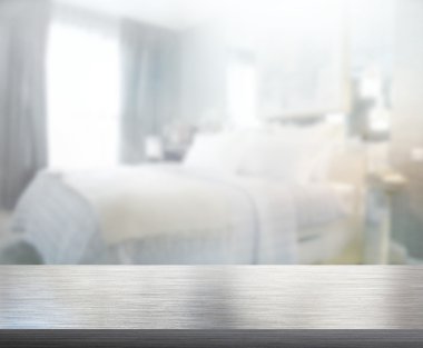 Masa üstü ve bulanıklık arka planda yatak odası