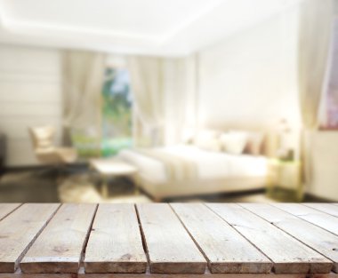 Masa üstü ve bulanıklık arka planda yatak odası