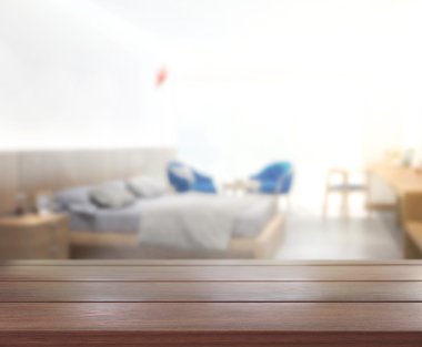 Masa üstü ve bulanıklık arka planda yatak odası