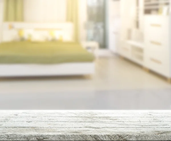 Mesa de fondo y desenfoque en el dormitorio — Foto de Stock