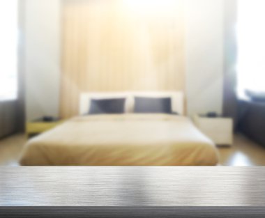 Masa üstü ve bulanıklık arka planda yatak odası