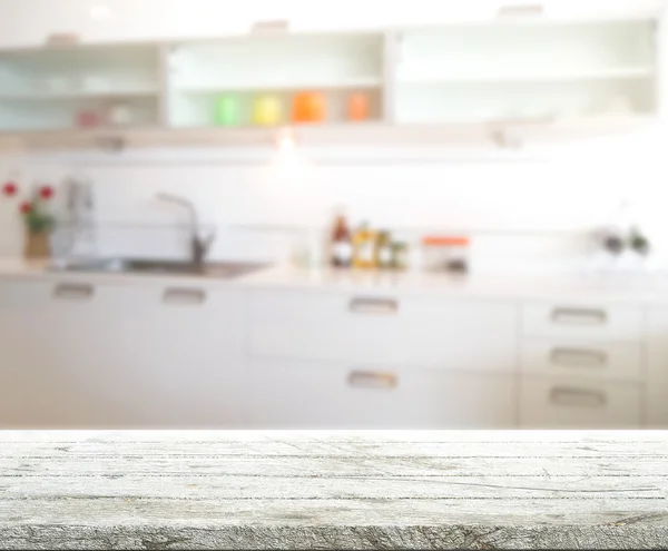 Tafelblad en Blur keuken kamer van achtergrond — Stockfoto