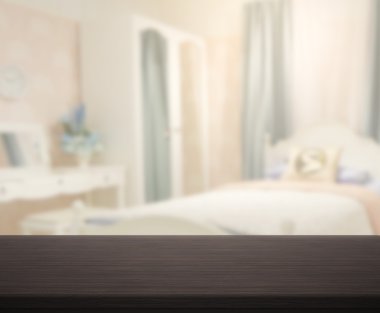 Masa üstü ve bulanıklık arka planda yatak odası