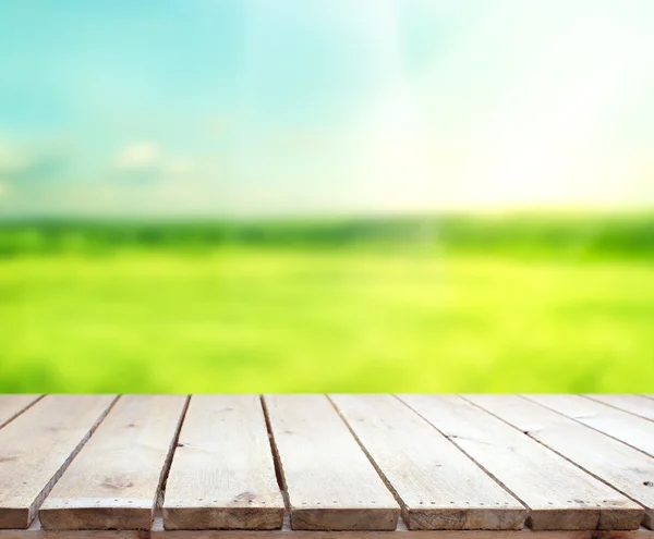 Mesa superior y difuminación naturaleza fondo — Foto de Stock