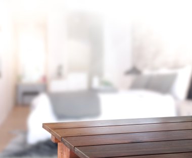 Masa üstü ve bulanıklık arka planda yatak odası