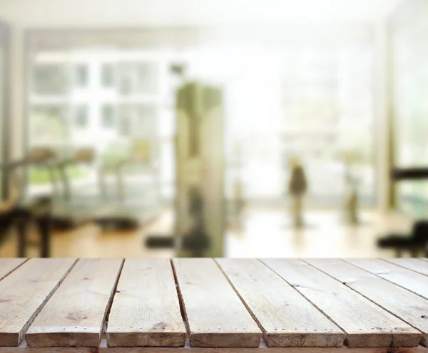 テーブル トップと背景のぼかしフィットネス ジム — ストック写真