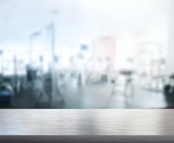 Table Top And Blur Fitness Gym of the Background — Stock Photo, Image