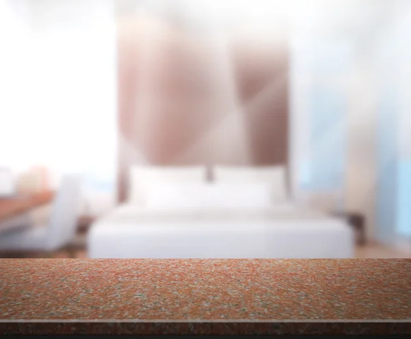 Столешница и размытый фон в спальне — стоковое фото