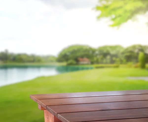 Tampo da mesa e desfoque natureza do fundo — Fotografia de Stock