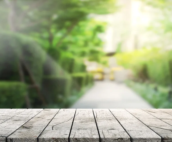 Bordsskivan och oskärpa natur bakgrund — Stockfoto