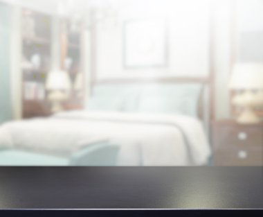 Masa üstü ve bulanıklık arka planda yatak odası
