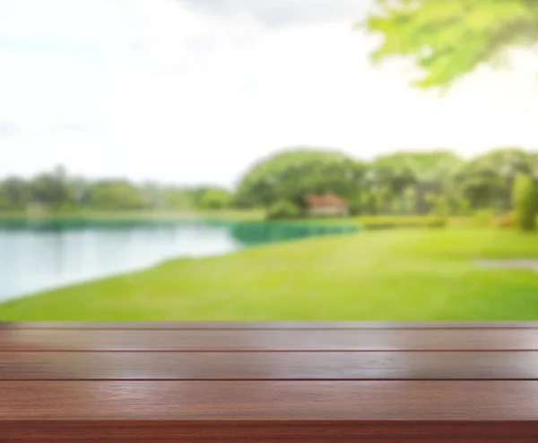 Tampo da mesa e desfoque natureza do fundo — Fotografia de Stock